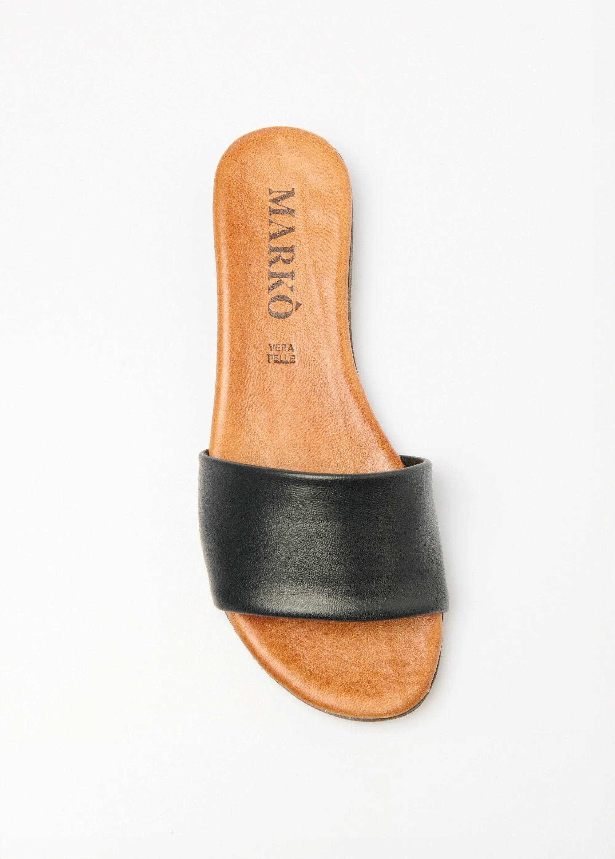 Leather mules with wide straps and flat soles