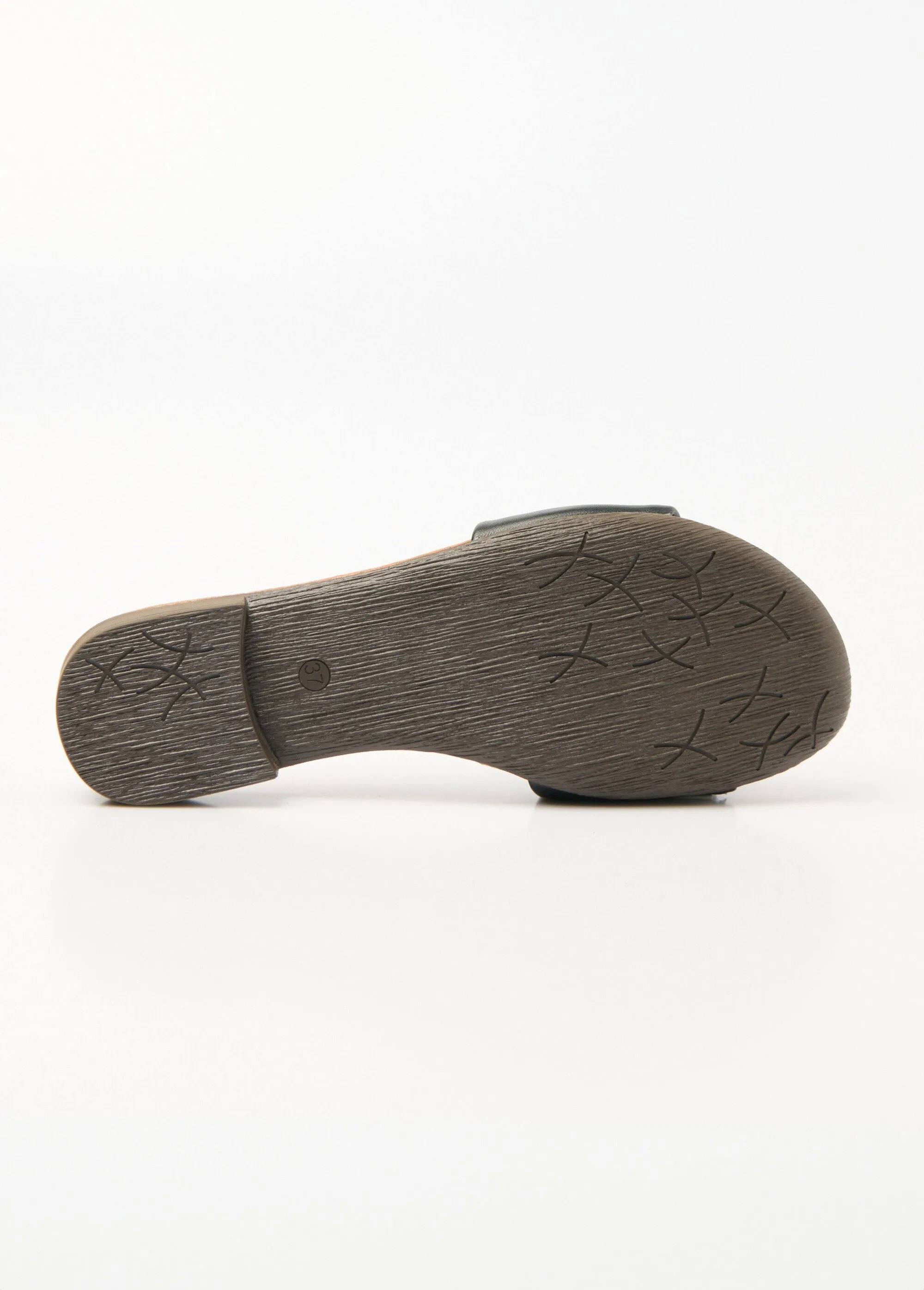 Leather mules with wide straps and flat soles