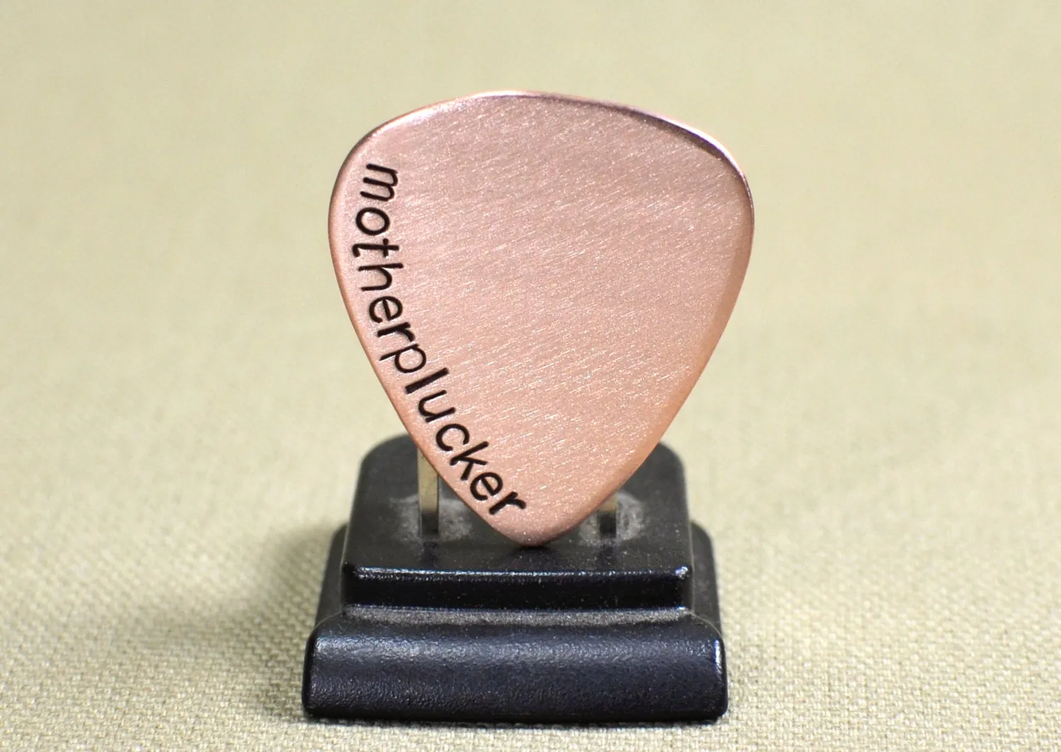 Motherplucker copper guitar pick