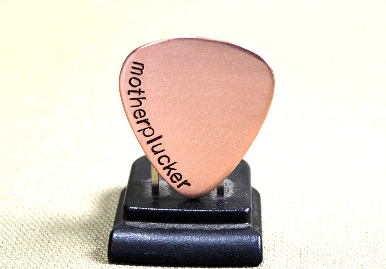 Motherplucker copper guitar pick